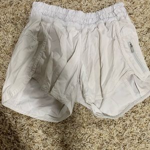 White lululemon running shorts, size 4